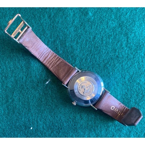 70 - Cased Omega Automatic wrist watch with strap.