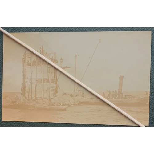 173 - Real photographic sepia postcard, Platte Fougere lighthouse Guernsey under construction, showing con... 