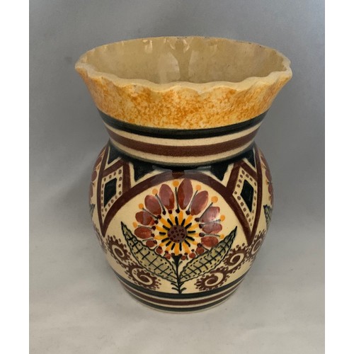 1 - An early 20th century Quimper vase, of baluster form with crimped top and typical decoration, signed... 