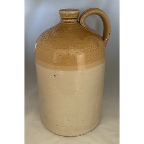 21 - Stoneware two tone flagon, impressed 'J.B. Renouf Wine Merchant Guernsey' 29cm high.