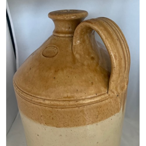 26 - Stoneware two tone flagon, incised 'Bucktrout & Co. (Thomas Elliott) Guernsey. Lent Jar Not For Sale... 