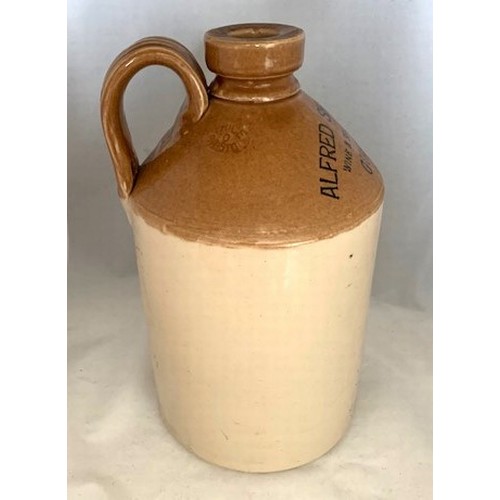 29 - Stoneware two tone flagon, with black transfer 'Alfred Sheppard Ltd. Wine and Spirit Merchants Guern... 