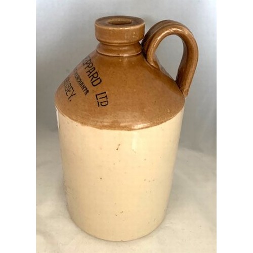 29 - Stoneware two tone flagon, with black transfer 'Alfred Sheppard Ltd. Wine and Spirit Merchants Guern... 