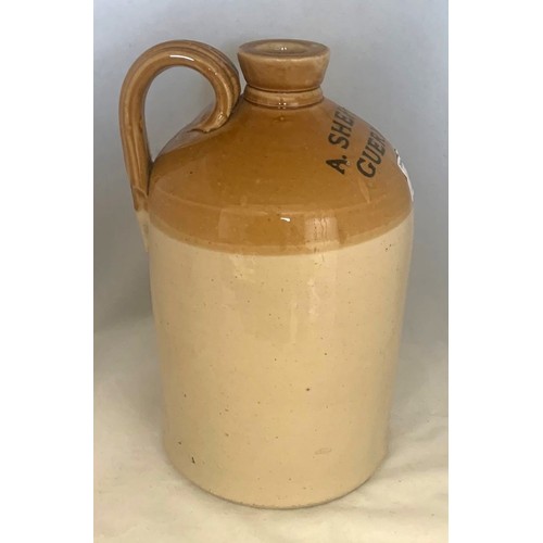 33 - Stoneware two tone flagon, with black transfer 'A.Sheppard Guernsey', half gallon size, 26cm high.