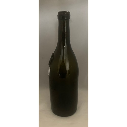 37 - Black glass wine bottle, with seal 'LP', attributed to the Le Pelley family of Guernsey, 30cm high.