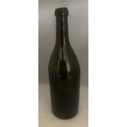 37 - Black glass wine bottle, with seal 'LP', attributed to the Le Pelley family of Guernsey, 30cm high.