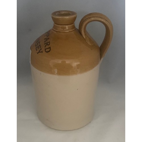 40 - Stoneware two tone flagon, with black transfer 'A.Sheppard Guernsey' quarter gallon size 21cm high.