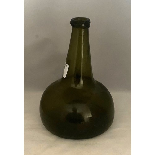 41 - Continental green glass onion shaped wine bottle, with deep kick to base, 20cm high.