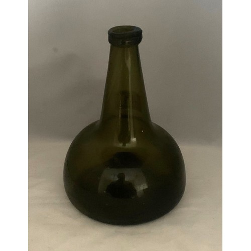 41 - Continental green glass onion shaped wine bottle, with deep kick to base, 20cm high.