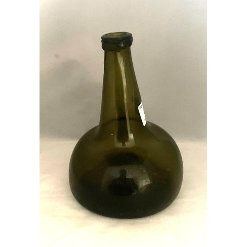 41 - Continental green glass onion shaped wine bottle, with deep kick to base, 20cm high.