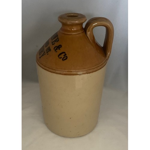 43 - Stoneware two tone flagon, with black transfer 'Le Quesne & Co. Burrard St. Jersey' half gallon size... 