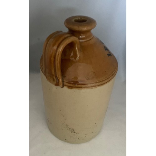 43 - Stoneware two tone flagon, with black transfer 'Le Quesne & Co. Burrard St. Jersey' half gallon size... 