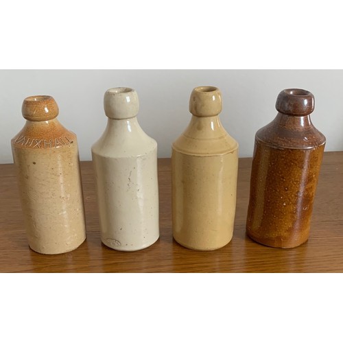 46 - Four stoneware Ginger Beer bottles, Barretts Vauxhall, North Devon Ilfracombe, J.Wheatley Sheffield ... 