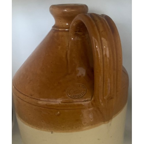 36 - Stoneware two tone flagon by Doulton & Co. Limited, impressed 'Mackay & Co. Wine Merchants Guernsey'... 