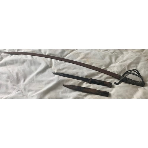 77 - A vintage Military Sabre or Cavalry Sword,  in poor condition, together with a Bayonet, both as foun... 