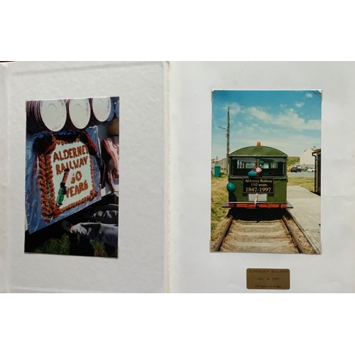 143 - A commemorative album of photographs, 150 years of the Alderney Railway, some Alderney views, Harbou... 