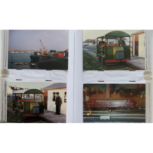 143 - A commemorative album of photographs, 150 years of the Alderney Railway, some Alderney views, Harbou... 