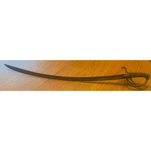 77 - A vintage Military Sabre or Cavalry Sword,  in poor condition, together with a Bayonet, both as foun... 