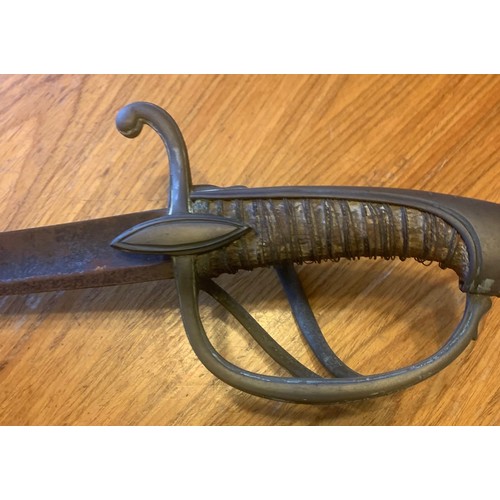 77 - A vintage Military Sabre or Cavalry Sword,  in poor condition, together with a Bayonet, both as foun... 