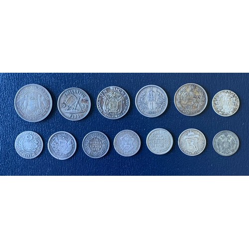 101 - A sundry collection of World silver coinage (13).