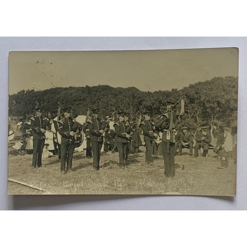 157 - Real photographic postcard by Le Cocq, Pipers Royal Irish Regiment Alderney Cattle Fair July 13th 19... 