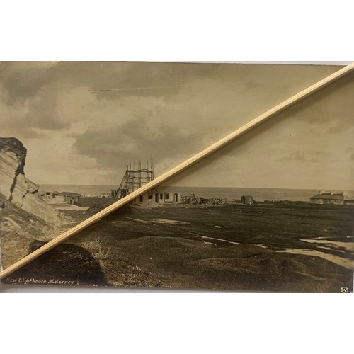 163 - Real photographic postcard by Westness, distant view showing the construction of the Lighthouse Alde... 