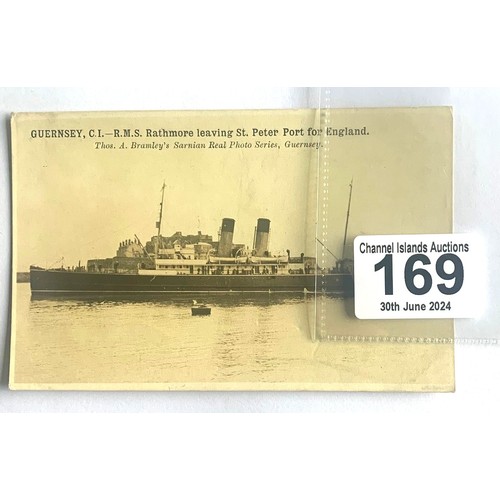 169 - Thomas Bramley Guernsey real photographic postcard, R.M.S. Rathmore leaving St Peter Port Harbour Gu... 