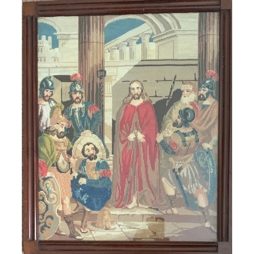 138 - A mahogany framed religious themed woolwork picture, 46 x 37cm.