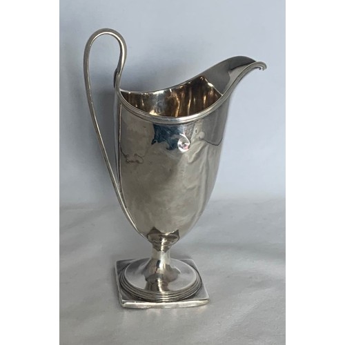 8 - George II silver cream jug, by Henry Chawner London 1791, of helmet form with engraved Militia type ... 