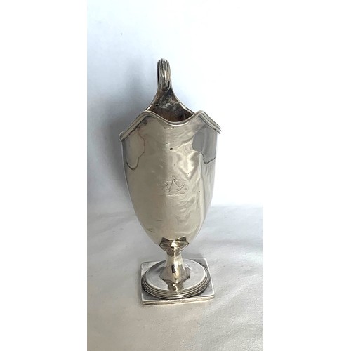 8 - George II silver cream jug, by Henry Chawner London 1791, of helmet form with engraved Militia type ... 