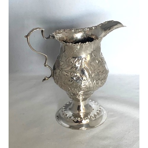 13 - Silver cream jug, by William Chandless London 1854, with birds and floral repoussé decoration, engra... 