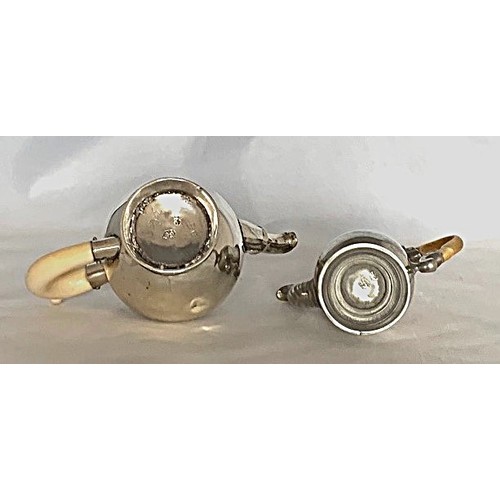 9 - A miniature white metal teapot with bone handle, together with a miniature white metal coffee pot wi... 