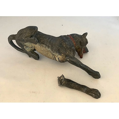 82 - A cold painted metal dog ornament, in as found condition, 17cm long.