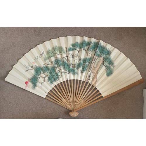 15 - Chinese hand painted and bamboo opera fan, decorated with flying birds amongst trees, 22 bamboo stic... 