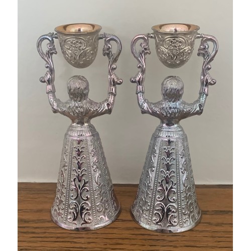 11 - Pair of Dutch silver plated and gilt traditional wedding or wager cups in the form of two women hold... 