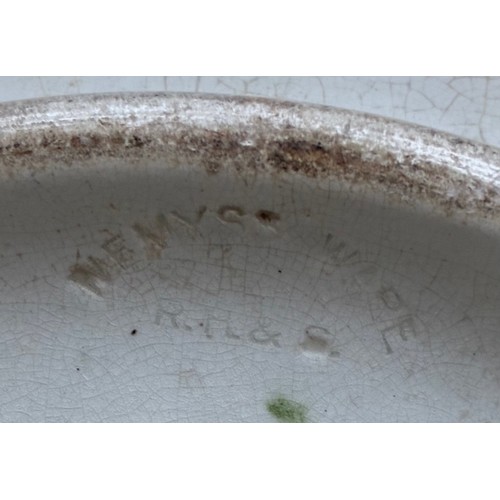 28 - Wemyss Ware pottery bowl of large proportions, decorated with twenty-three black painted Cockerels a... 