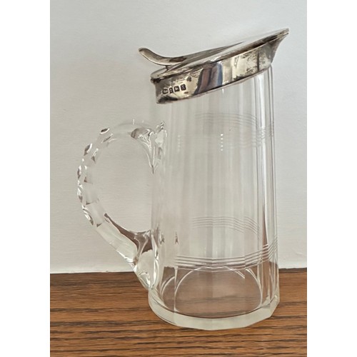 25 - Silver mounted glass whisky toddy or water jug, Birmingham 1922 by J. Gloster, with halmarked and hi... 