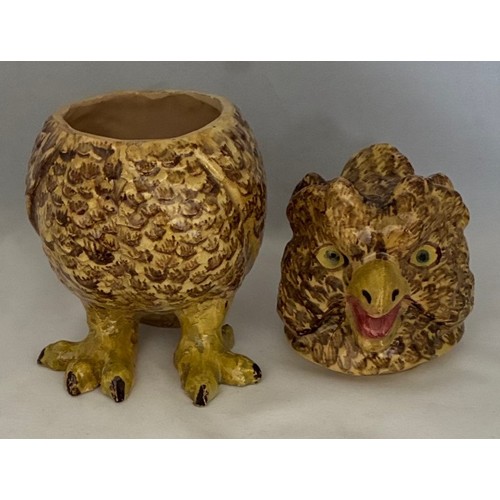 56 - A Martinware style painted pottery jar and cover in the form of a grotesque owl, early 20th century,... 