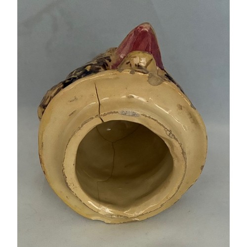 56 - A Martinware style painted pottery jar and cover in the form of a grotesque owl, early 20th century,... 