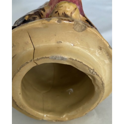 56 - A Martinware style painted pottery jar and cover in the form of a grotesque owl, early 20th century,... 