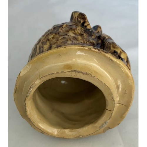 56 - A Martinware style painted pottery jar and cover in the form of a grotesque owl, early 20th century,... 