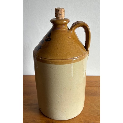 58 - Guernsey two tone stoneware half gallon size flagon, transfer printed Bertin Feuillerat Caves De Bor... 