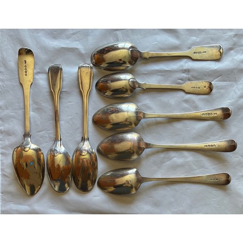 26 - Eight silver table or serving spoons, various town and silversmiths marks, the longest 22.5cm combin... 