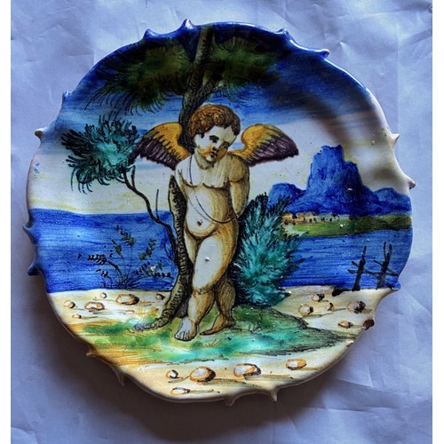 95 - Italian Cantagalli Majolica polychrome plate, 19th century, decorated with a cupid resting beside a ... 