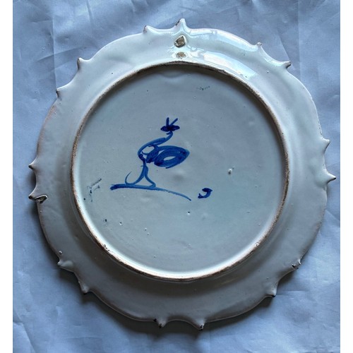 95 - Italian Cantagalli Majolica polychrome plate, 19th century, decorated with a cupid resting beside a ... 