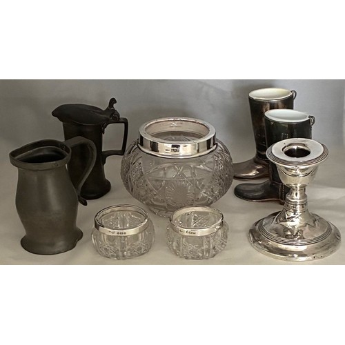 13 - Silver cased dwarf candlestick, pair silver rimmed salts, silver rimmed jar, pewter measures, pair o... 