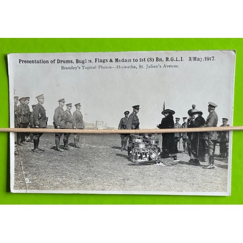 128 - Real photographic postcard by Thomas Bramley Guernsey, Presentation of Drums, Bugles, Flags & Medals... 