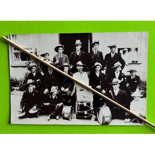 135 - Real photographic postcard by Woodwards Guernsey,  Military Band.