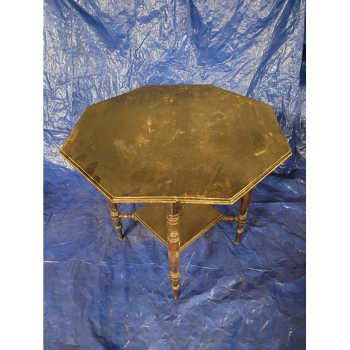 14 - A NEAT SIZED VICTORIAN OCTAGONAL OCCASIONAL TABLE. FOUR TURNED LEGS, WITH A
SINLGE SHELF BELOW THE L... 