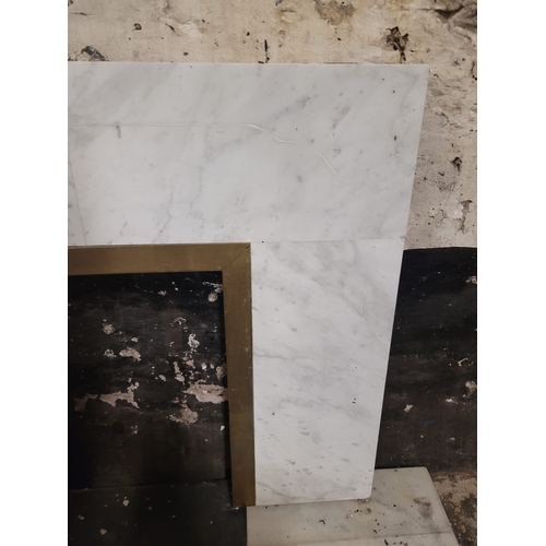 15 - A NICE QUALITY WHITE MARBLE FIREPLACE AND BLACK GRANITE HEARTH, WITH BRASS
INSERT.